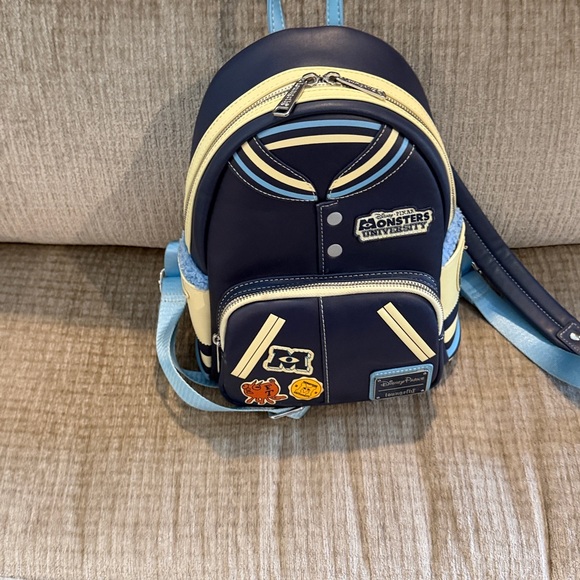 Disney Monsters University varsity jacket Navy and Cream Backpack 10 x 8 - Picture 8 of 10